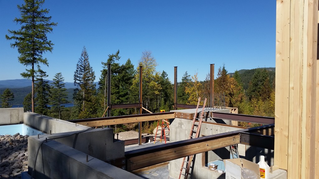 Red Iron reinforcement per the structural engineer Foundation Walls Poured, Now Comes the Iron Framework